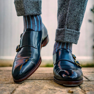 Shellvedge wearing a pair of navy blue shell cordovan monkstrap shoes