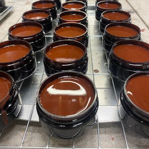 Fresh Batch of Walnut Leather Cream Polish cooling on a rack