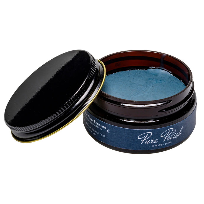 Navy Blue Water Resistant Leather Cream used for reducing water spotting and rain penetration of leather shoes and boots open jar on white background